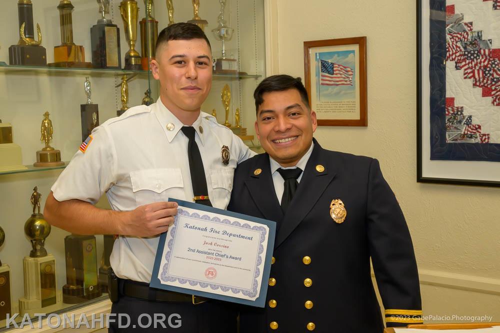 The Second Assistant Chief's Award, presented by John Cohen, right, went to Lieutenant Josh Corsino. Photo by Gabe Palacio.