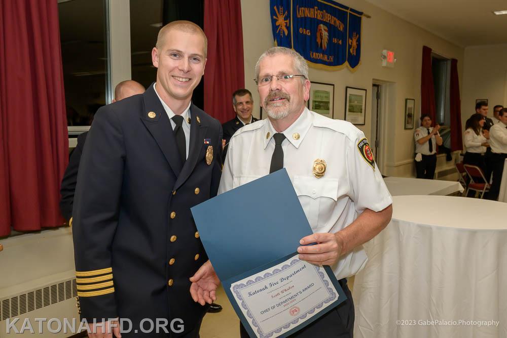 The Chief's Award, presented by Matt Whalen, left, wen to Captain Scott Whalen. Photo by Gabe Palacio.